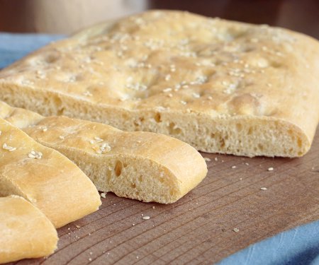 Lagana is a simple Greek flatbread that is traditionally eaten only once a year, on Clean Monday, the first day of Lent in the Greek Orthodox tradition.  | www.CuriousCuisiniere.com