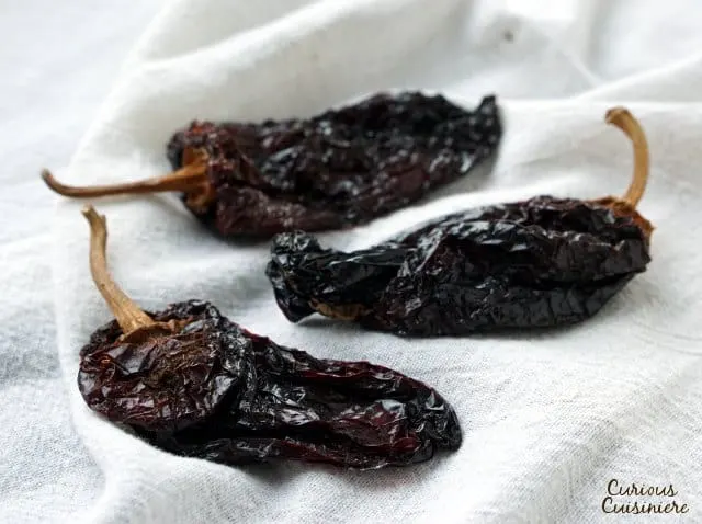 Ancho chilie peppers are low in heat, with a sweet and smoky flavor. | www.CuriousCuisiniere.com