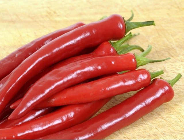 Cayenne peppers are long, skinny, bright red chiles.
