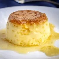 Spanish Flan is an egg custard dessert to make, impressive to serve to guests, and it can be made ahead of time. Spanish egg flan is creamy, caramely, and delicious! | www.CuriousCuisiniere.com