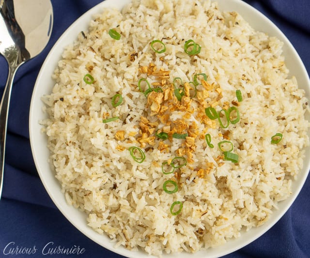 If you've never had Filipino Garlic Fried Rice, then you are missing out. Garlic elevates this simple fried rice recipe, giving it a robust flavor that make it a great side dish, no matter what meal you eat it for! | www.CuriousCuisiniere.com