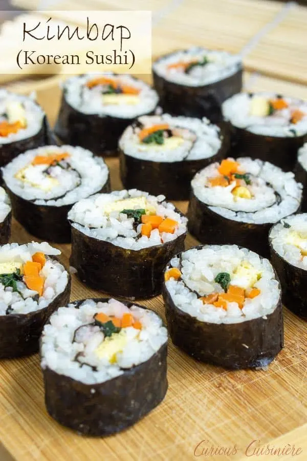 Kimbap (or gimbap) could be called Korean sushi, and if you are a fan of sushi, you are going to love the light and slightly nutty flavor of these rolls. They're the perfect recipe for summer picnics and lunches!  #sushi #korean #picnic| www.CuriousCuisiniere.com