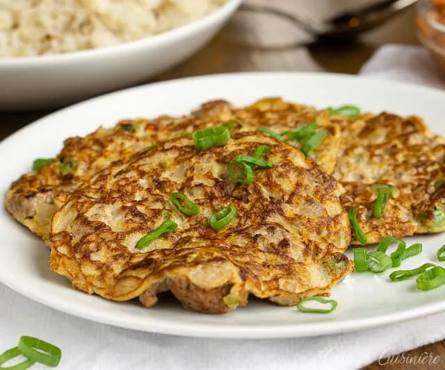 Tortang Giniling is a Filipino ground beef omelette. It is unique in that the omelette is made more like a fritter and is filled with lots of beef and veggies. It is a delicious recipe for breakfast or for a light lunch or snack.  | www.CuriousCuisiniere.com