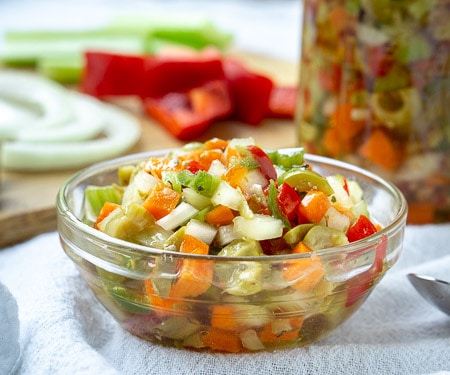 Hot Giardiniera Relish uses diced vegetables and ample hot peppers to create a tangy and spicy topping for sandwiches, hot dogs, and more. | www.CuriousCuisiniere.com