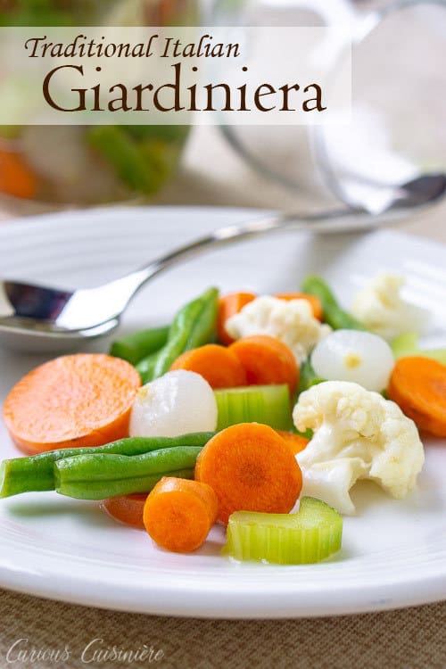 Traditional Italian Giardiniera is full of large chunks of pickled vegetables and is served as an antipasto or appetizer. This recipe for giardiniera for canning uses no oil, so it is the perfect way to preserve your summer produce. #pickled #antipasto #canning | www.CuriousCuisiniere.com