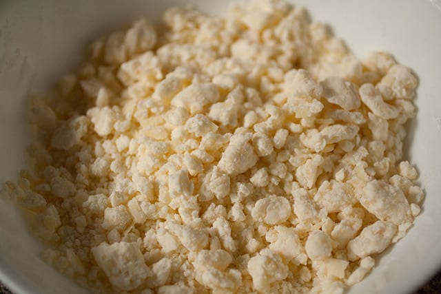 Cassava flour, cheese, butter, and a pinch of salt make up this crumbly mbeju dough mixture. | www.CuriousCuisiniere.com 