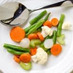 Traditional Italian Giardiniera is full of large chunks of pickled vegetables and is served as an antipasto or appetizer. This recipe for giardiniera for canning uses no oil, so it is the perfect way to preserve your summer produce.  | www.CuriousCuisiniere.com