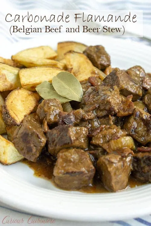 Carbonade Flamande is a Belgian beef stew with beer that is full of caramelized onions, bacon, and tender, slow cooked beef. Served with thick cut fries or boiled potatoes, this stew is the perfect recipe for winter comfort food. #beefstew #comfortfood | www.CuriousCuisiniere.com
