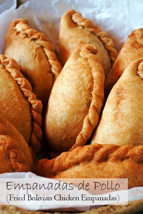 With a crispy-sweet crust and a juicy chicken filling, Empanadas de Pollo, Bolivian chicken empanadas, are a great recipe for your next get together. #empanadas #chickenfilling #bolivian | www.CuriousCuisiniere.com