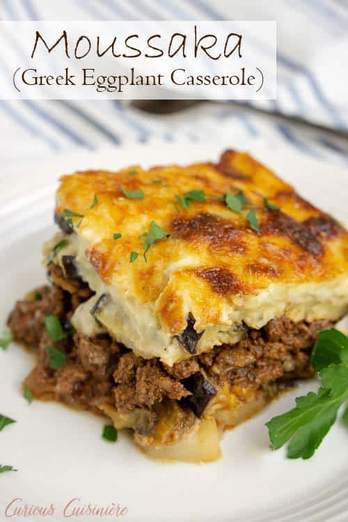 Greek Moussaka is an eggplant casserole filled with layers of eggplant and a warmly spiced meat sauce, all covered in a rich béchamel sauce. This is a recipe for some serious Greek comfort food! #eggplant #casserole #comfortfood | www.CuriousCuisiniere.com 