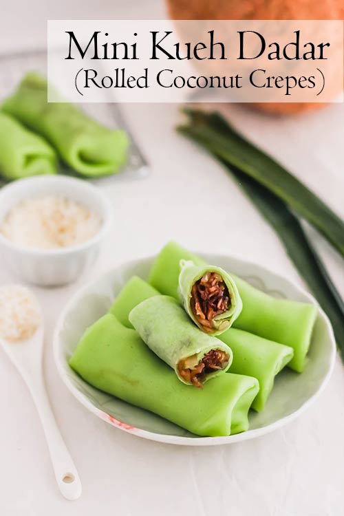 Kueh dadar is a Southeast Asian snack with a vibrant color. These mini, rolled coconut and pandan crepes are filled with more sweetened coconut, for a tasty sweet treat! | www.CuriousCuisiniere.com