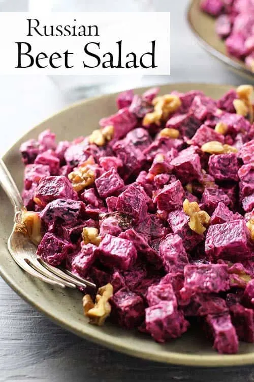 This Russian Beet Salad is a perfect combination of earthy beets, sweet prunes, and crunchy walnuts. It's a very simple recipe made with only four or five ingredients. It's a great salad to make in advance as it tastes even better the next day. #beets #russianfood #beetsalad