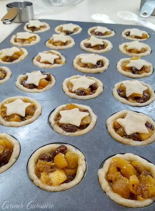 Mini mince pies getting prepped to go into the oven for Christmas baking. | www.CuriousCuisiniere.com