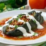 Baked Chiles Rellenos, filled with chorizo, rice, and melted cheese, are an easy way to enjoy Mexican stuffed peppers without all the hassle of frying. | www.CuriousCuisiniere.com