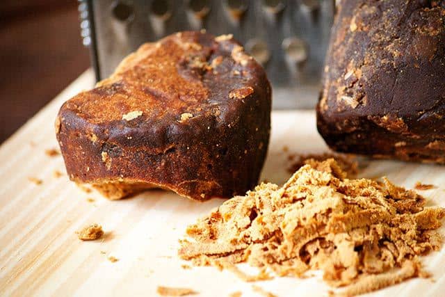 Panela, piloncillo or papelón in solid form and grated | Curious Cuisiniere