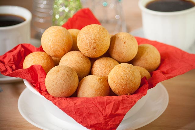 Frying Buñuelos (Cheese Fritters) .