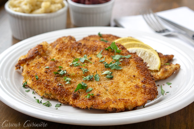 Hänchen-Schnitzel, German Chicken Schnitzel ,is an impressive, yet easy dinner recipe that the whole family will love. | www.CuriousCuisiniere.com