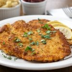 Hänchen-Schnitzel, German Chicken Schnitzel ,is an impressive, yet easy easy dinner recipe that the whole family will love. | www.CuriousCuisiniere.com