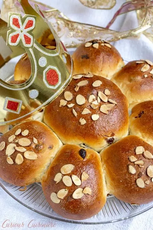 Dreikönigskuchen Swiss Three Kings Cake overhead with a king's crown| Curious Cuisiniere