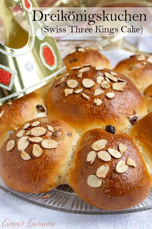 Dreikönigskuchen, Three Kings Cake, may also be called an Epiphany cake. These citrus and raisin bread rolls are lightly sweet and wonderfully fluffy! | www.CuriousCuisiniere.com 