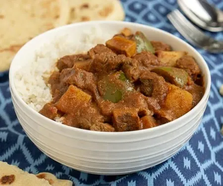 Madras Beef Curry with Vegetables and rice. | www.CuriousCuisiniere.com