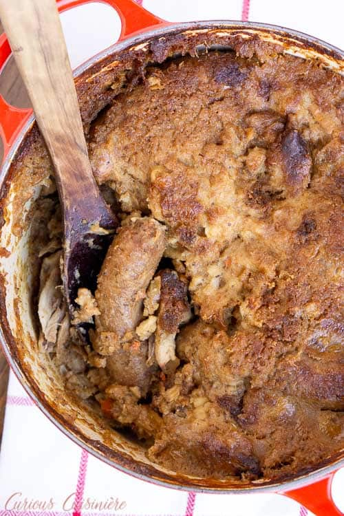 Our easy French cassoulet recipe includes chicken, sausage, beans, and bacon, and brings you the flavors of traditional cassoulet in just a few hours. | www.CuriousCuisiniere.com