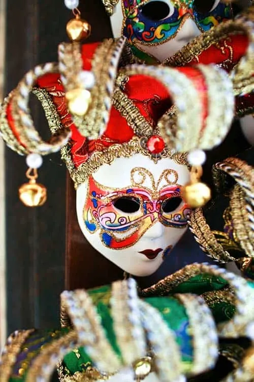 A white and red Mardi Gras mask from Venice, Italy