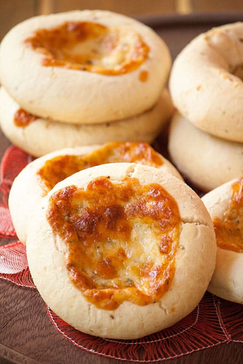 Chipa 4 quesos, cassava and cheese bread from Paraguay with golden cheese baked on top. 