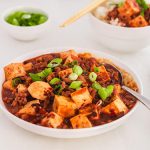 A serving bowl of Mapo Tofu, a quick Chinese Sichuan dinner recipe. | www.CuriousCuisiniere.com