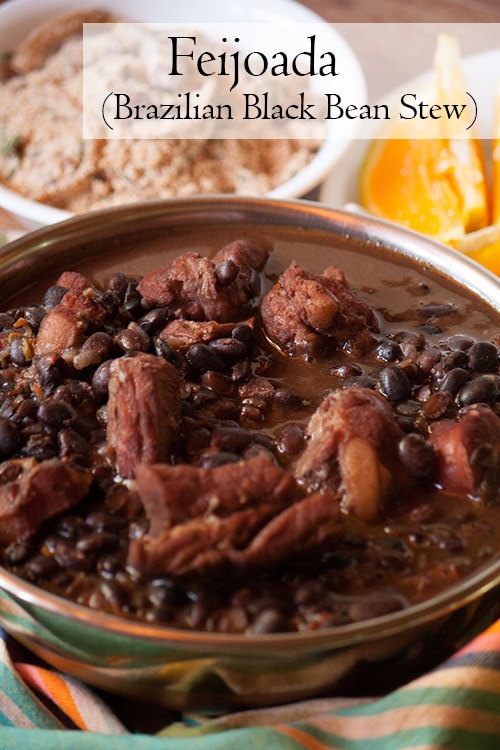 Feijoada, Brazilian black bean stew served with farofa and orange slices