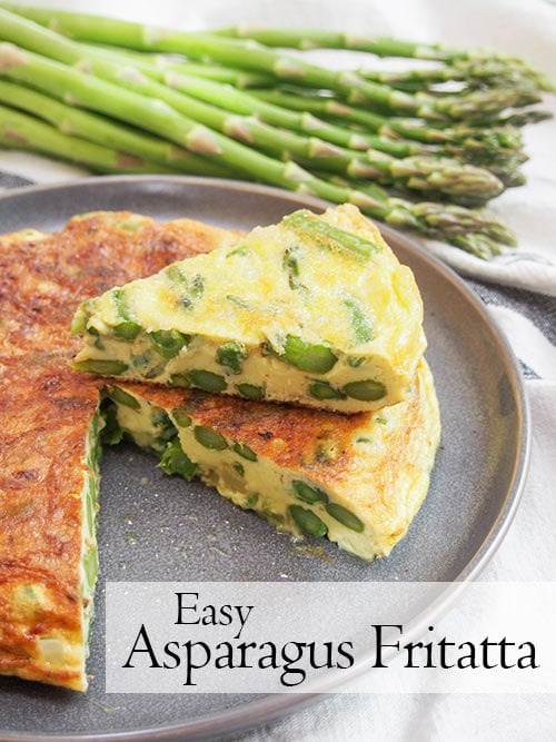 Asparagus fritatta, cut and plated with asparagus in the background and text.