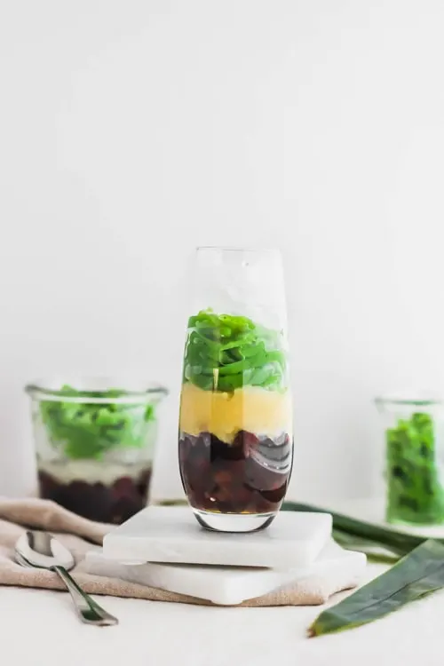 Cendol, Malaysian pandan jellies, layered with red azuki beans, yellow mung beans, before adding ice or coconut milk. 