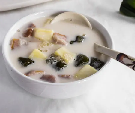 Bubur Cha Cha, a creamy and sweet Malaysian dessert made from yam, taro, and coconut milk. 