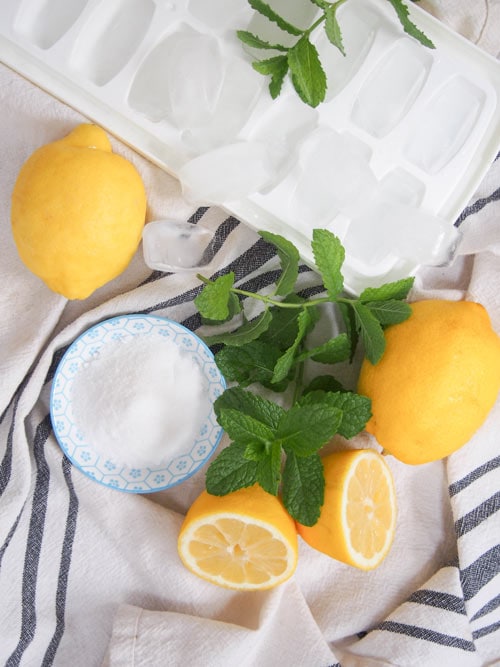 Ingredients to make Limonana Middle Eastern Mint Lemonade: sugar, lemons, mint, ice 