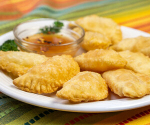 Brazilian Pastel de Queijo (Cheese Pastries) arranged on a plate