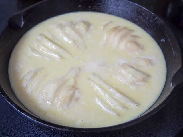 Pears and custard ready to bake into clafoutis.