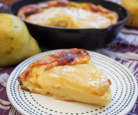 Slice of pear clafoutis.
