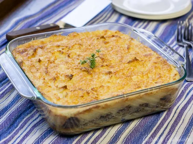 French Hachis Parmentier Potato and Beef Casserole in a glass baking dish