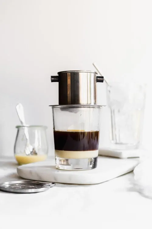 Strong brewed Vietnamese coffee with phin