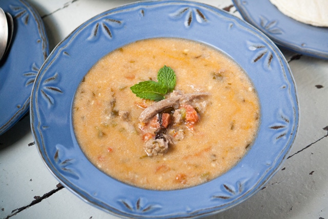 A blue bowl of Indio Viejo (Nicaraguan Beef Stew)