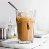 Tall glass of Vietnamese iced coffee horizontal image