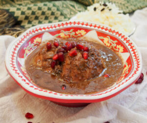 Fesenjan Persian chicken stew flavored with walnuts and pomegranate