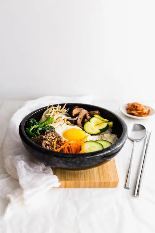 Korean Bibimbap Mixed Rice Bowl with a Runny Egg