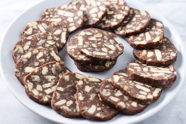 Russian Chocolate Salami (Chocolate Sausage) sliced on a platter