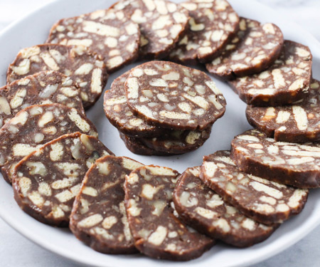 Russian Chocolate Salami sliced on a platter