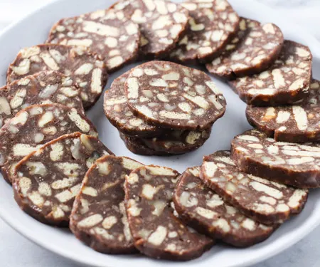 Russian Chocolate Salami sliced on a platter