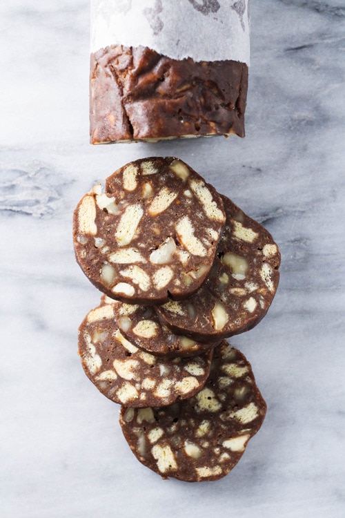 Russian Chocolate Salami (Chocolate Sausage) slicing from the roll