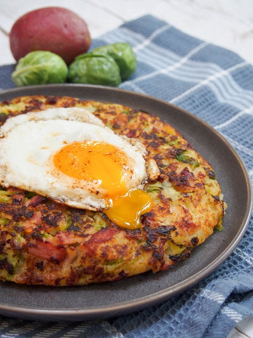 Bubble and Squeak (British Potato Cakes) with a runny egg