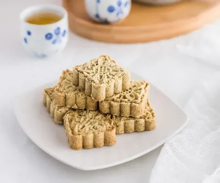 Chinese Macau-Style Mung Bean Almond Cookies on a white plate