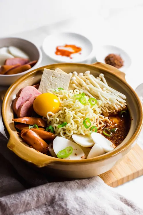 Budae Jjigae, or Korean Army Stew in a rustic bowl